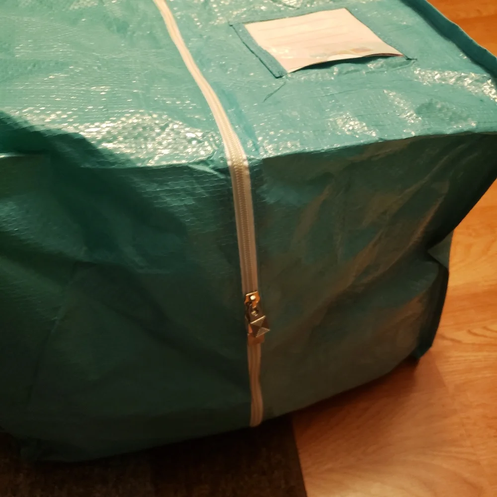 #3 - Garment bag - large. New in package. Never used. Heavy duty material.